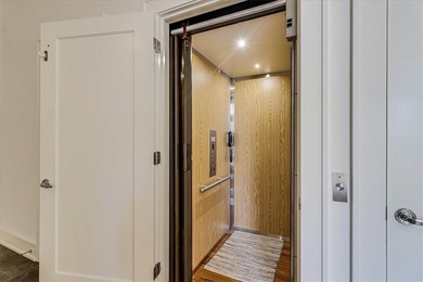 Such a STUNNING COAST CONDO! Turnkey with elevator, boat lift - photo 5