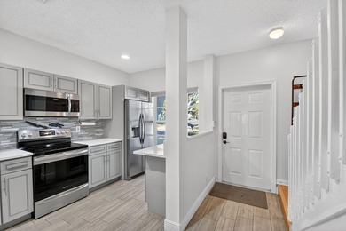 Updated and impeccable end unit townhouse in the highly sought - photo 7