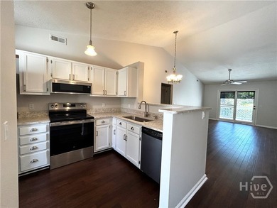 Bright, airy move-in-ready 2-bedroom, 2-bath upstairs condo with - photo 1