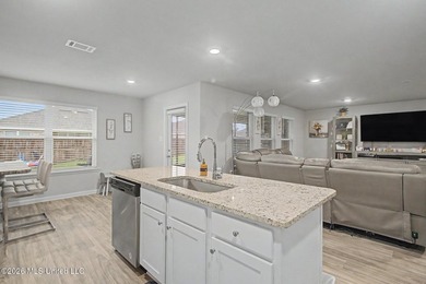 Welcome home to this spacious 4-bedroom, 2-bath property - photo 3