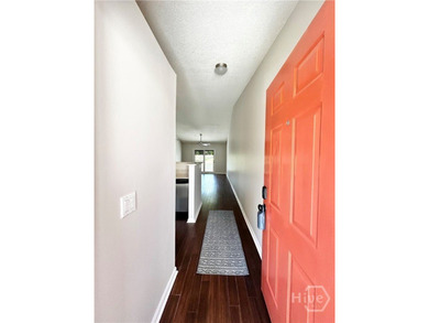 Bright, airy move-in-ready 2-bedroom, 2-bath upstairs condo with - photo 5