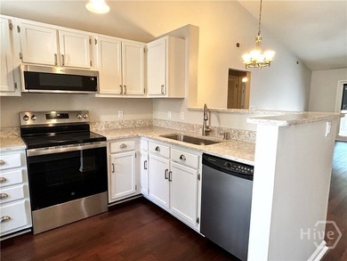 Bright, airy move-in-ready 2-bedroom, 2-bath upstairs condo with - photo 8