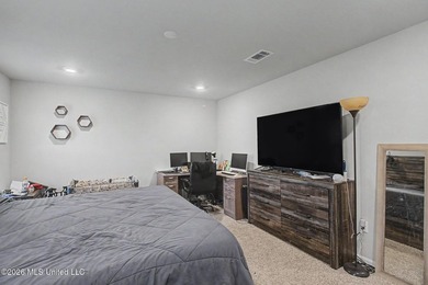 Welcome home to this spacious 4-bedroom, 2-bath property - photo 8