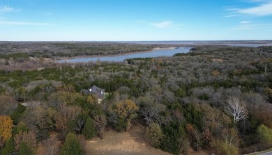 This prime lot on a quiet street in Rock Creek, Gordonville - photo 1