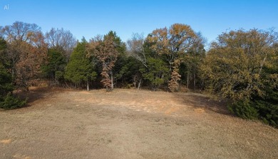 This prime lot on a quiet street in Rock Creek, Gordonville - photo 3
