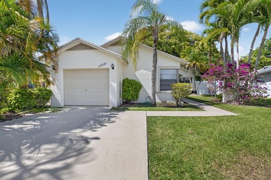This beautifully renovated 3-bedroom, 2-bath home is tucked away - photo 1