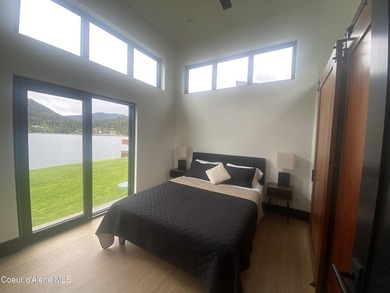 New Lakefront Quality Custom built home sitting at Lake Level on - photo 12