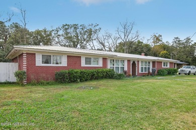 Welcome to this charming single-family ranch-style brick home - photo 3