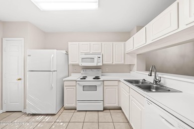 This attractively priced 2-bedroom condo with LAKE VIEWS in - photo 6