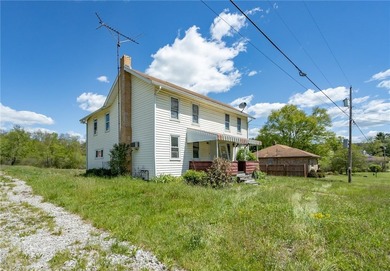 Farm house style two story on a relatively level country lot - photo 1