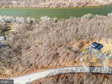 Discover the potential of this 4.9+/- acre waterfront parcel on - photo 12