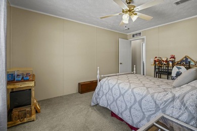 Three-bedroom, two-bathroom, single-story manufactured home with - photo 27