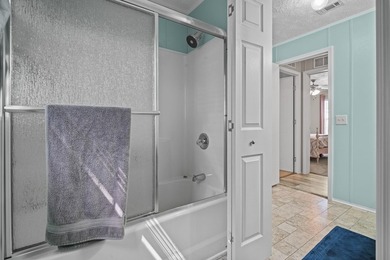 Three-bedroom, two-bathroom, single-story manufactured home with - photo 29