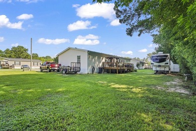Three-bedroom, two-bathroom, single-story manufactured home with - photo 38