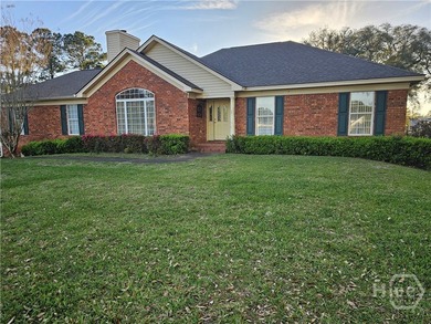Brick home with tidal creek wrapping around back and side of - photo 2
