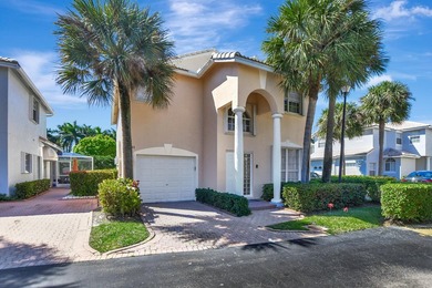 Welcome to 7363 Panache Way at Boca Pointe! This remodeled 4