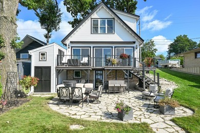 50 feet of prime frontage on Pewaukee Lake. Taken down to the - photo 24