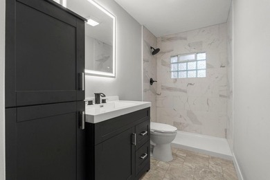 A fresh approach to one-level living! This zero-entry home sits - photo 12