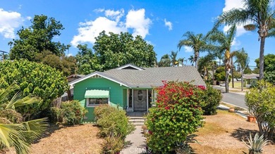 Step into the charm of this historic Santa Ana cottage, where - photo 1
