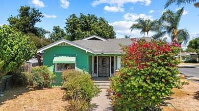Step into the charm of this historic Santa Ana cottage, where - photo 2