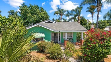 Step into the charm of this historic Santa Ana cottage, where - photo 3
