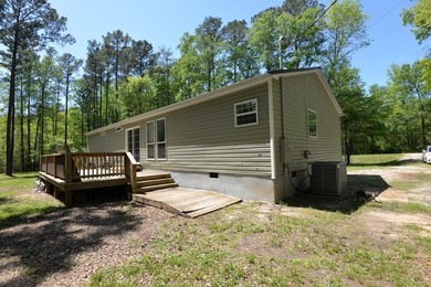 Conveniently located near Lake Sinclair and just minutes from - photo 2