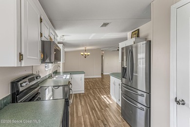 Enjoy this charming 3-bed, 2-bath home in Palm Bay Estates, a - photo 11