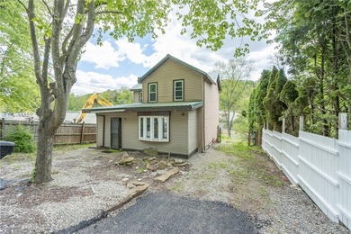 Lots of potential to finish what was started. Nice two story - photo 1