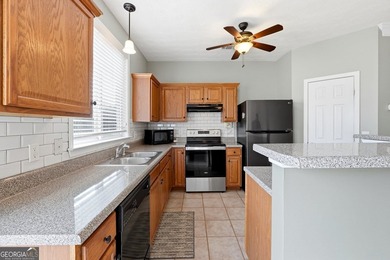 Built in 2005, this 1,551 sq. ft. 2-story townhome features 3 - photo 13