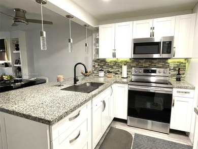 (private lake, pond, coastal) Condo For Sale in Tamarac Florida