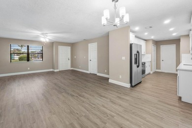 Welcome home to this updated 3-bedroom, 2-bath single-family - photo 4