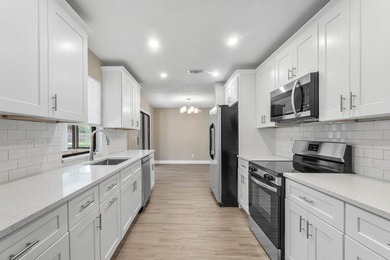 Welcome home to this updated 3-bedroom, 2-bath single-family - photo 5