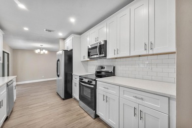 Welcome home to this updated 3-bedroom, 2-bath single-family - photo 7