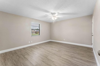 Welcome home to this updated 3-bedroom, 2-bath single-family - photo 8
