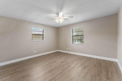 Welcome home to this updated 3-bedroom, 2-bath single-family - photo 10