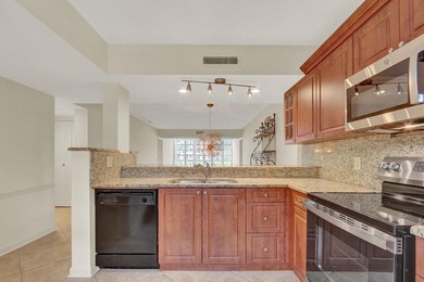 Move-in ready first floor unit, just steps from the - photo 1