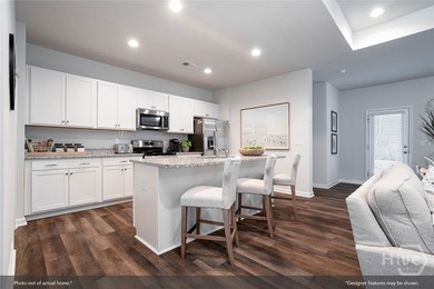 The Gwinnett II is a well-designed one-story home featuring four - photo 4