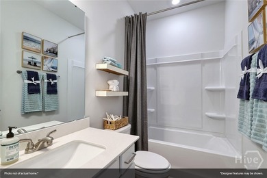 The Lawrence is a thoughtfully designed one-story home featuring - photo 3