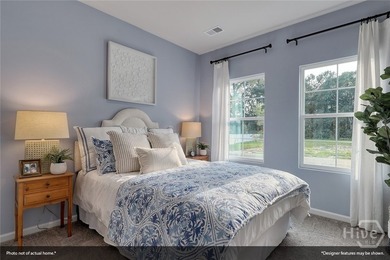 The Lawrence is a thoughtfully designed one-story home featuring - photo 5