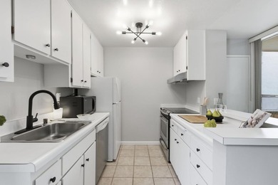 Welcome to 250 Whitmore Avenue, Unit 104, a bright and - photo 6