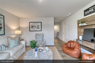 The Lawrence is a thoughtfully designed one-story home featuring - photo 7