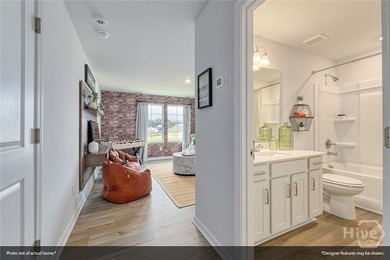 The Lawrence is a thoughtfully designed one-story home featuring - photo 8