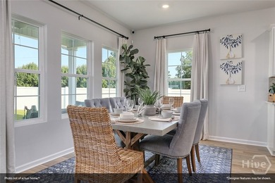 The Lawrence is a thoughtfully designed one-story home featuring - photo 10