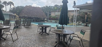Beautifully updated 2 bedroom 2 bath corner unit In the - photo 1