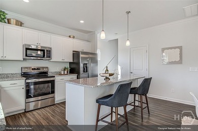 The Russell is a versatile two-story home featuring four - photo 4