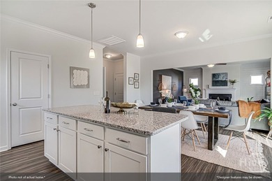 The Russell is a versatile two-story home featuring four - photo 6