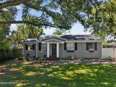 This home offers a blend of classic charm and modern updates in - photo 3