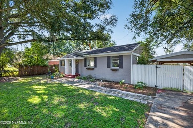 This home offers a blend of classic charm and modern updates in - photo 4