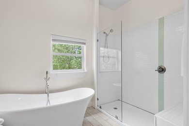 Just steps from the beach, with room for an RV or boat, this - photo 25