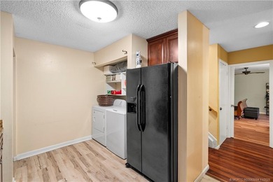 Discover a well-kept townhome offering valuable updates and - photo 3